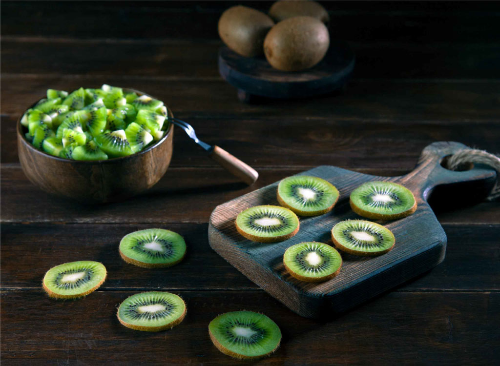 barusfruits company's kiwi in wooden bowl