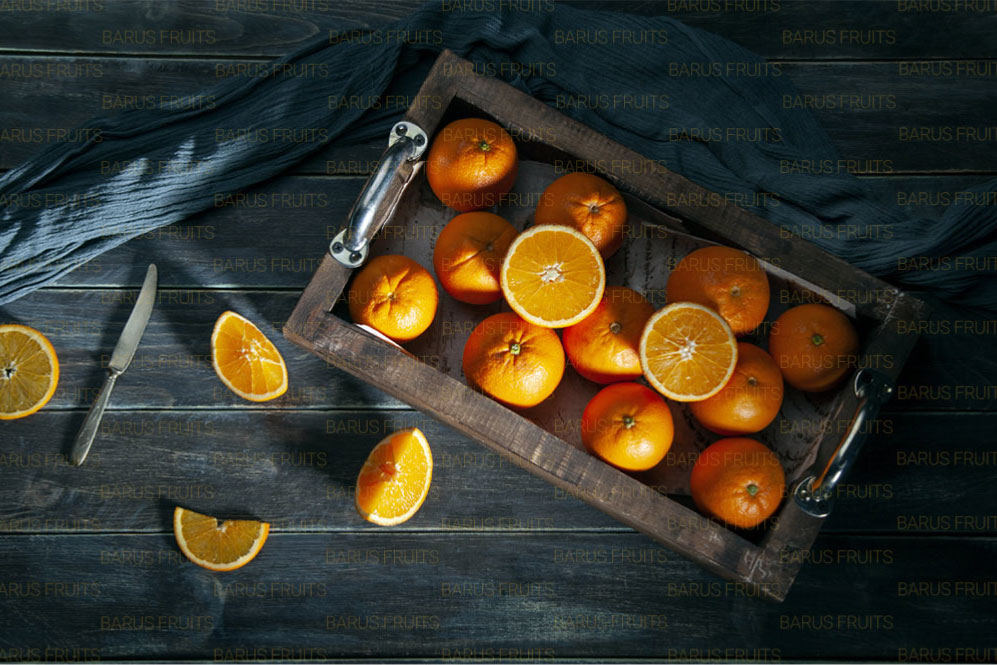 barusfruits company's oranges in the basket